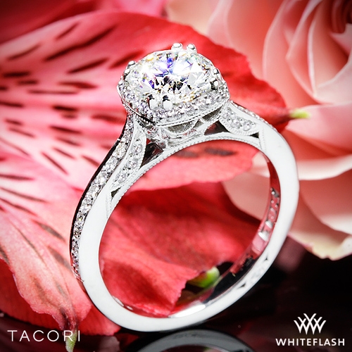 Tacori Engagement Ring set on some pink/red flowers